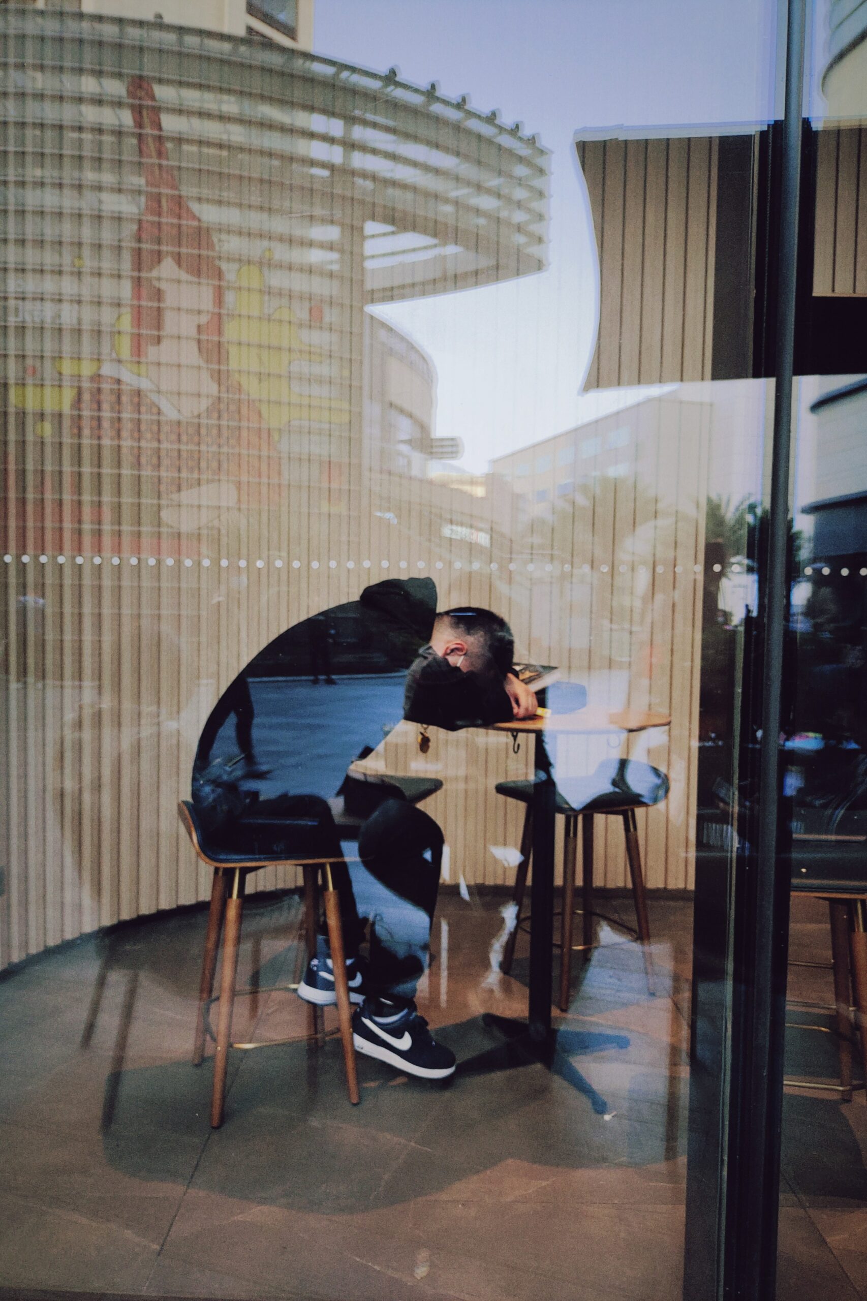 Tired Adult, sleeping on desk at work